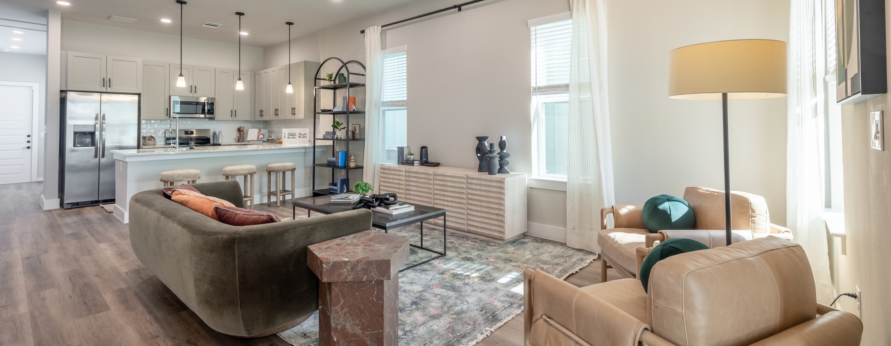 living room with couch chairs and lamp